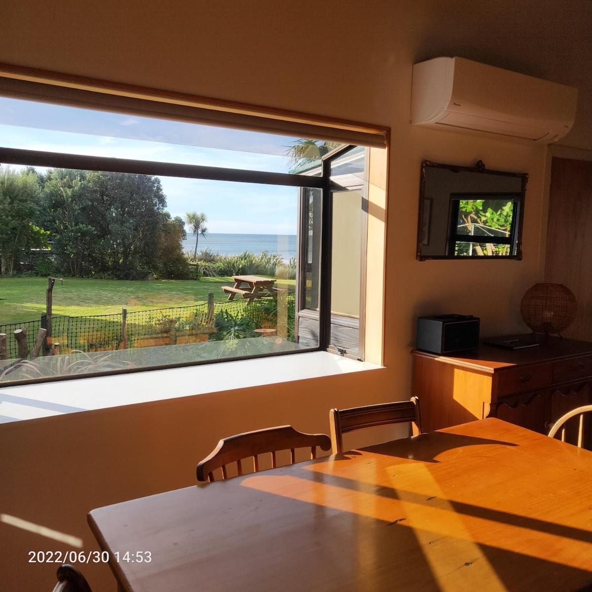 Beachfront Bliss - Your Parapara Seaside Retreat Екстер'єр фото